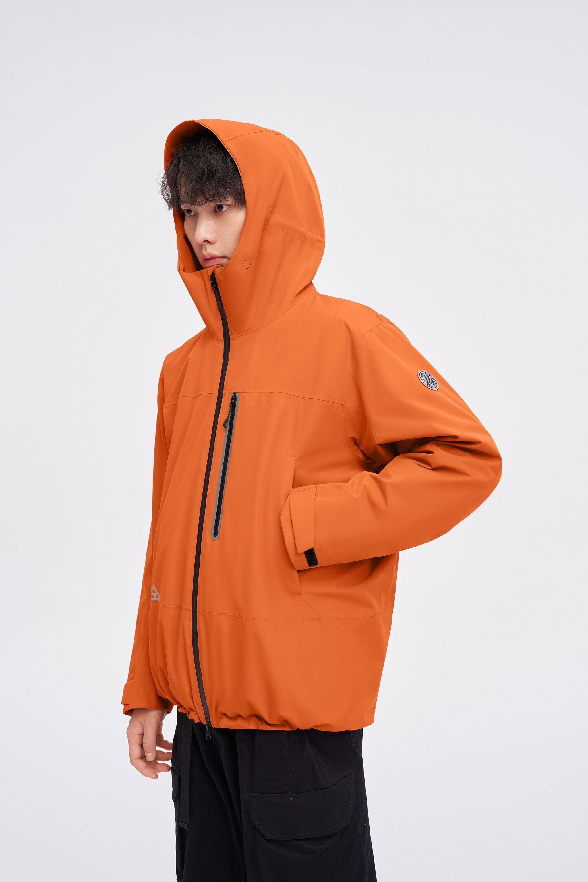 3 in 1 All Weather Goose Down Parka 2420 — Explore our 3-in-1 All-Weather Jacket, meticulously crafted to excel in all in Pale Orange, sizes L–XL; waterproof, windproof