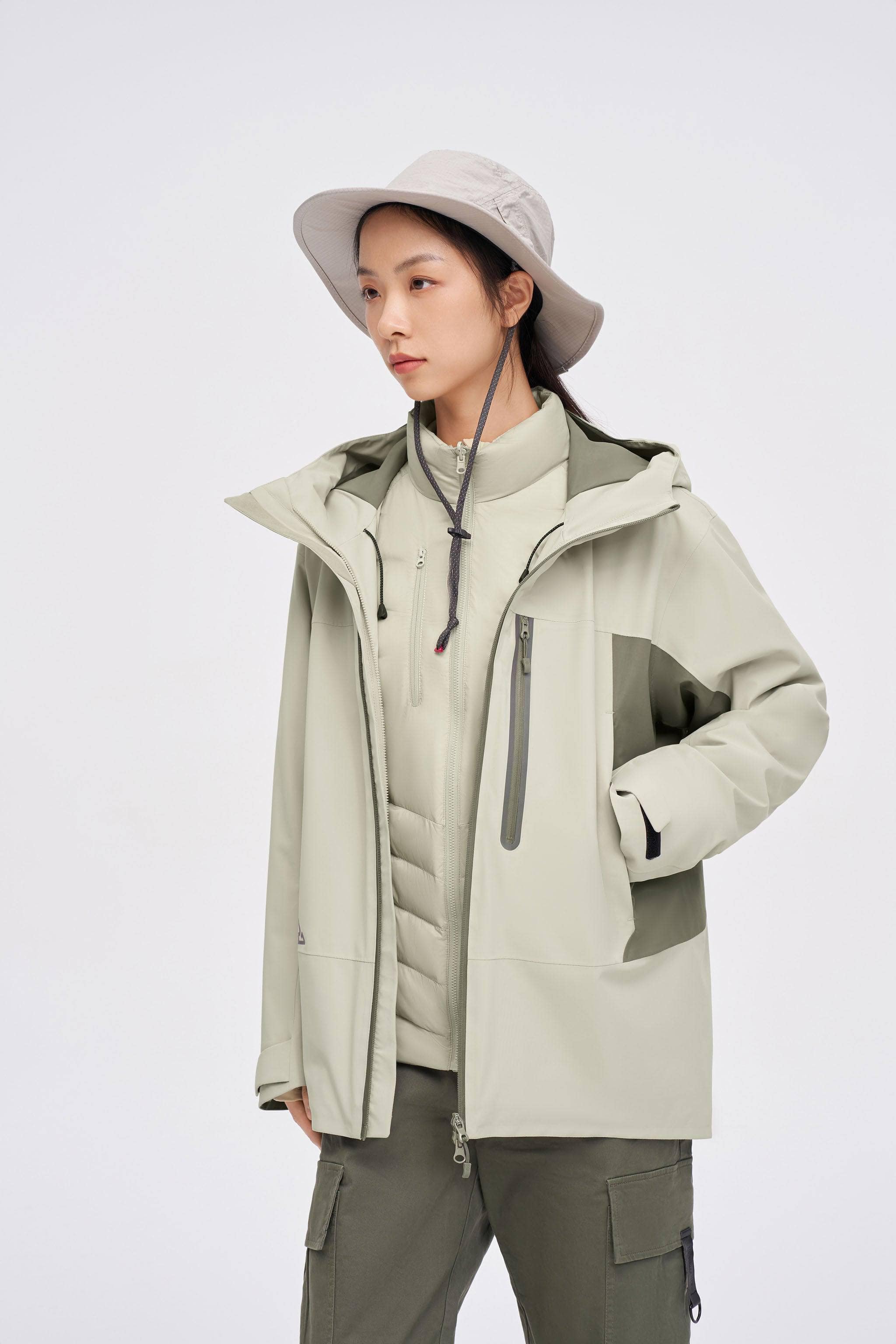 3 in 1 All Weather Goose Down Parka 2420 — Explore our 3-in-1 All-Weather Jacket, meticulously crafted to excel in all in Sand, sizes XXS–XXXL; waterproof, windproof