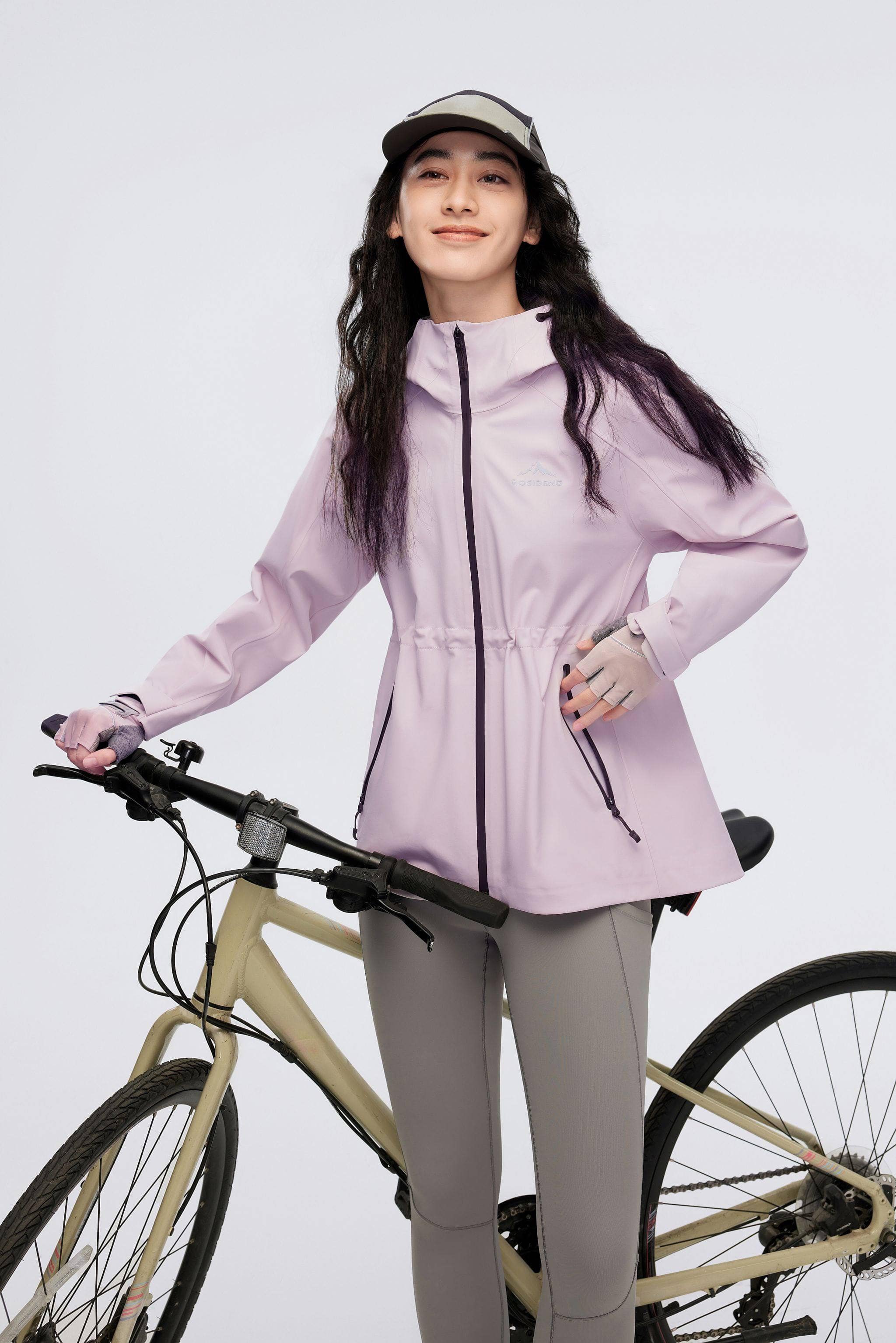 Women's Hooded Soft Shell Functional Jacket 2024 — design prioritises functionality against the elements in Powder Lotus, sizes 6–14; water-resistant, windproof