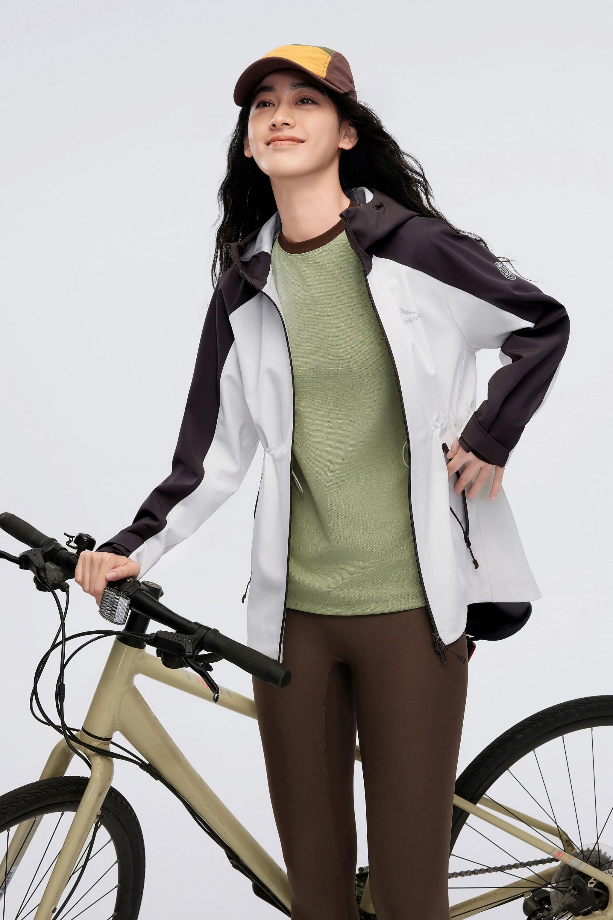 Women's Hooded Soft Shell Functional Jacket 2024 — design prioritises functionality against the elements — view 2; water-resistant, windproof